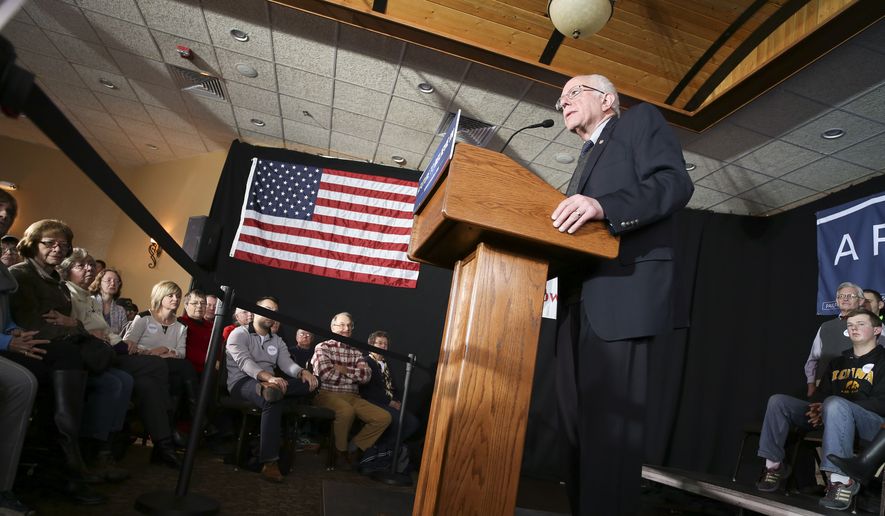 In this photo taken Tuesday, Jan. 19, 2016, Democratic presidential candidate Sen. Bernie Sanders, I-Vt., asks for support during the Feb. 1 Iowa Caucus during a campaign speech at Santa Maria Winery in Carroll, Iowa. (Jeff Storjohann/Carroll Daily Times Herald via AP) MANDATORY CREDIT